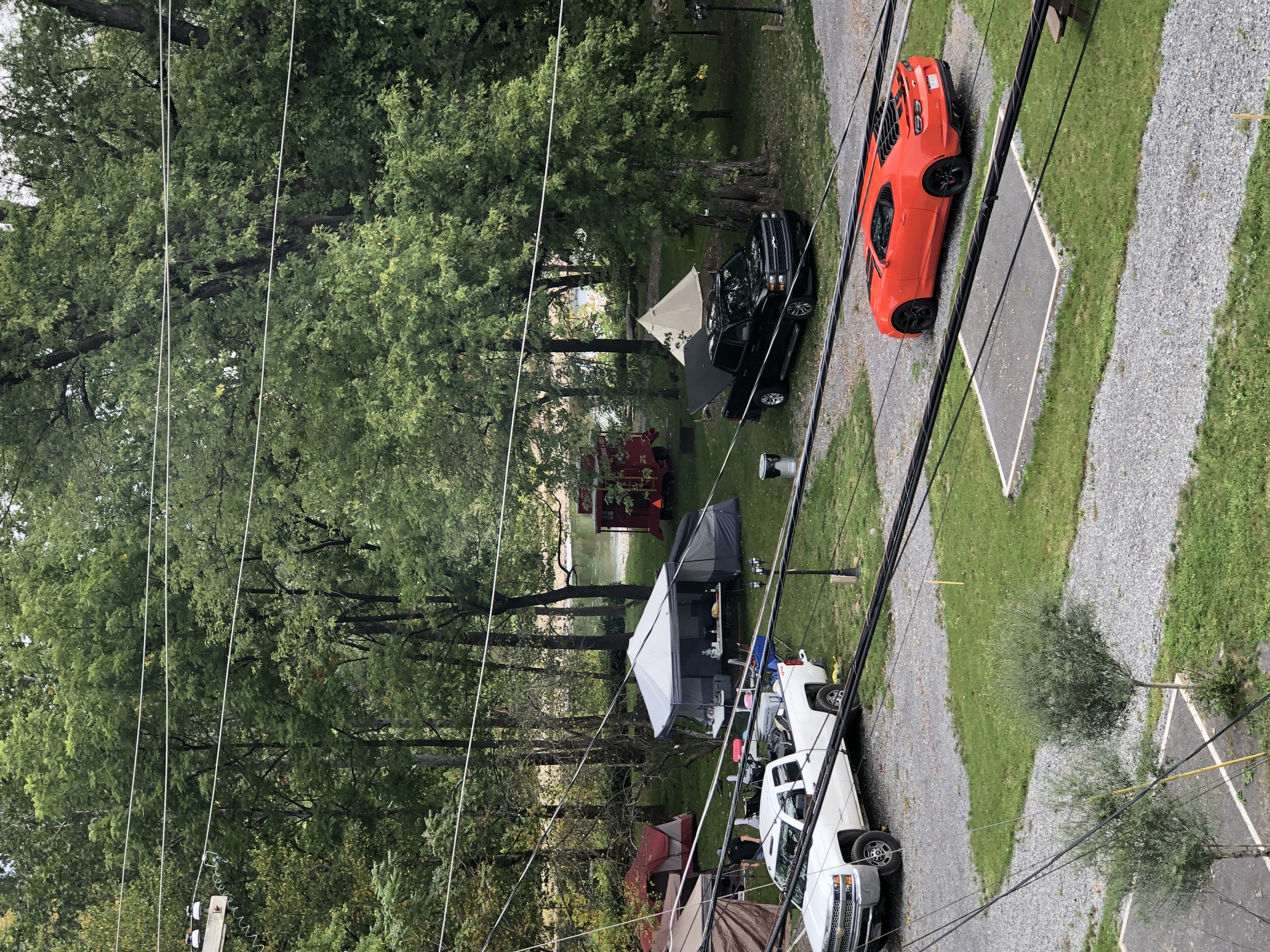 A wide view of the campsite with the river in the background